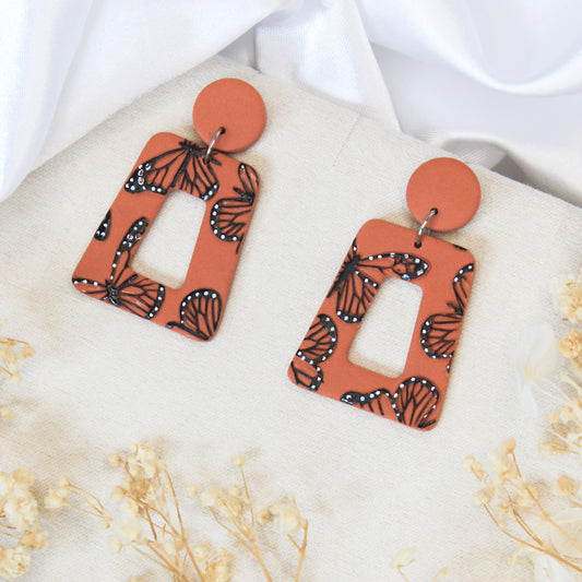 Handmade polymer clay trapezium earrings with handpainted monarch butterfly print
