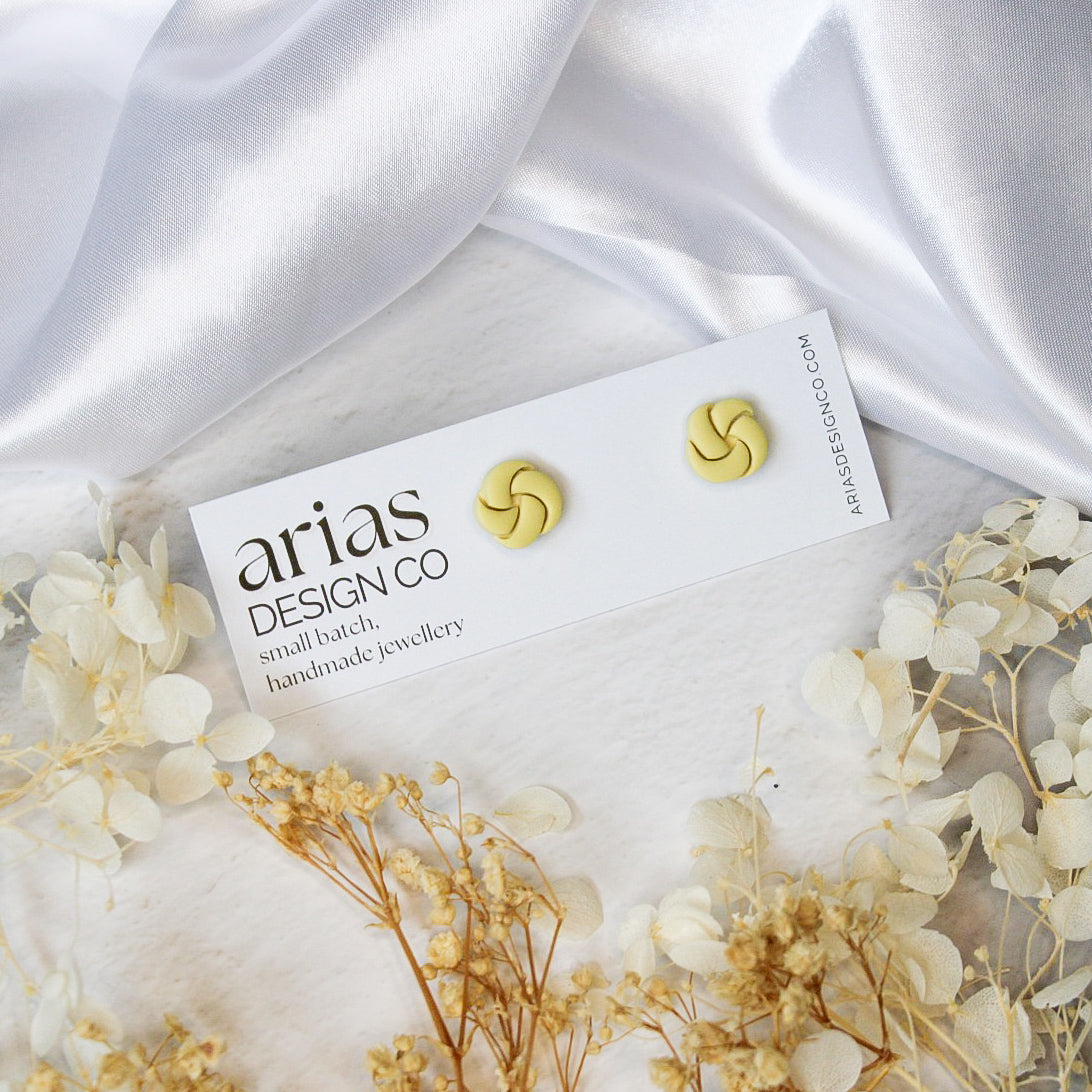 Handmade mini knot stud earrings in butter yellow | NZ handmade jewellery & accessories