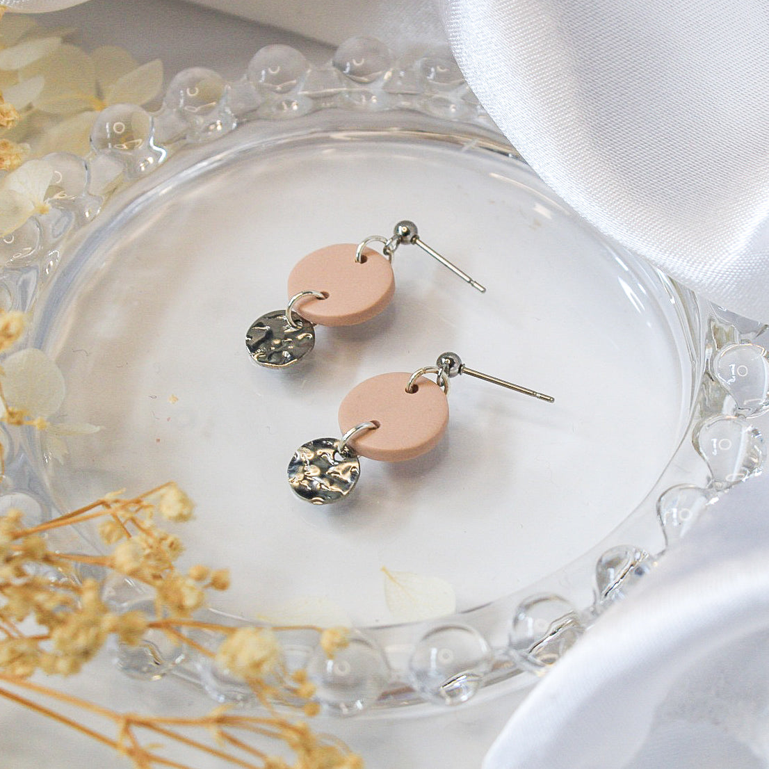 Handmade pink polymer clay earrings with silver hammered charm