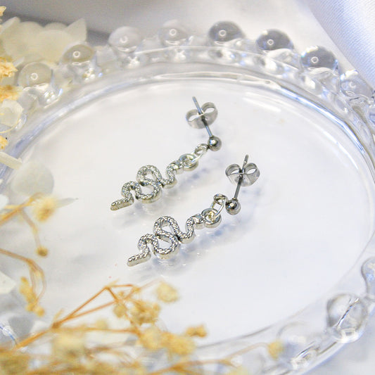 Snake charm earrings with hypoallergenic stainless steel studs
