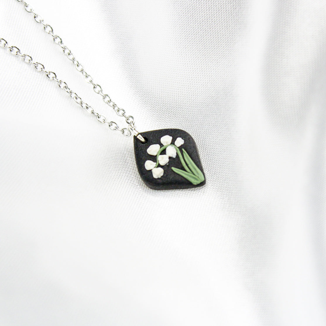 Silver raven lily of the valley birth flower necklace — May pendant