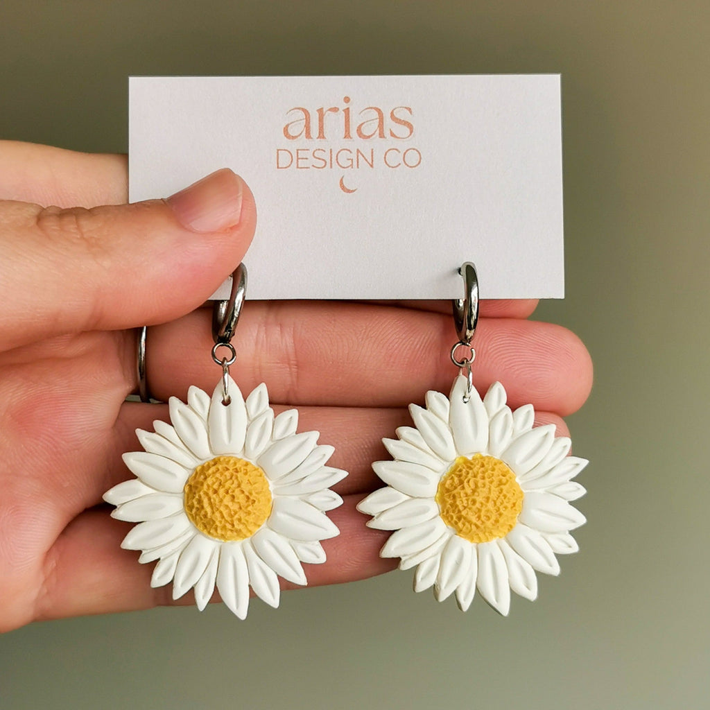 Bold hand-sculpted daisy earrings in silver | statement earrings New Zealand