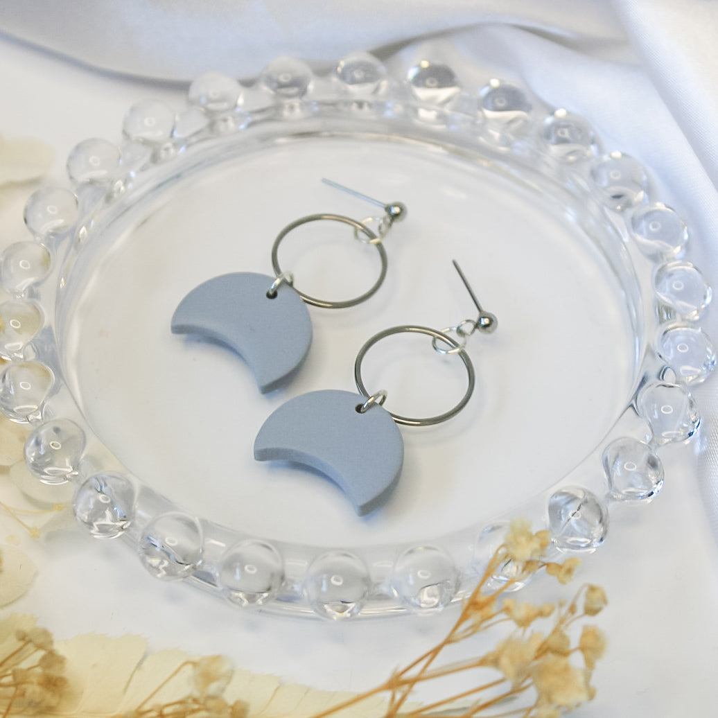 Handmade earrings with sky blue moon design