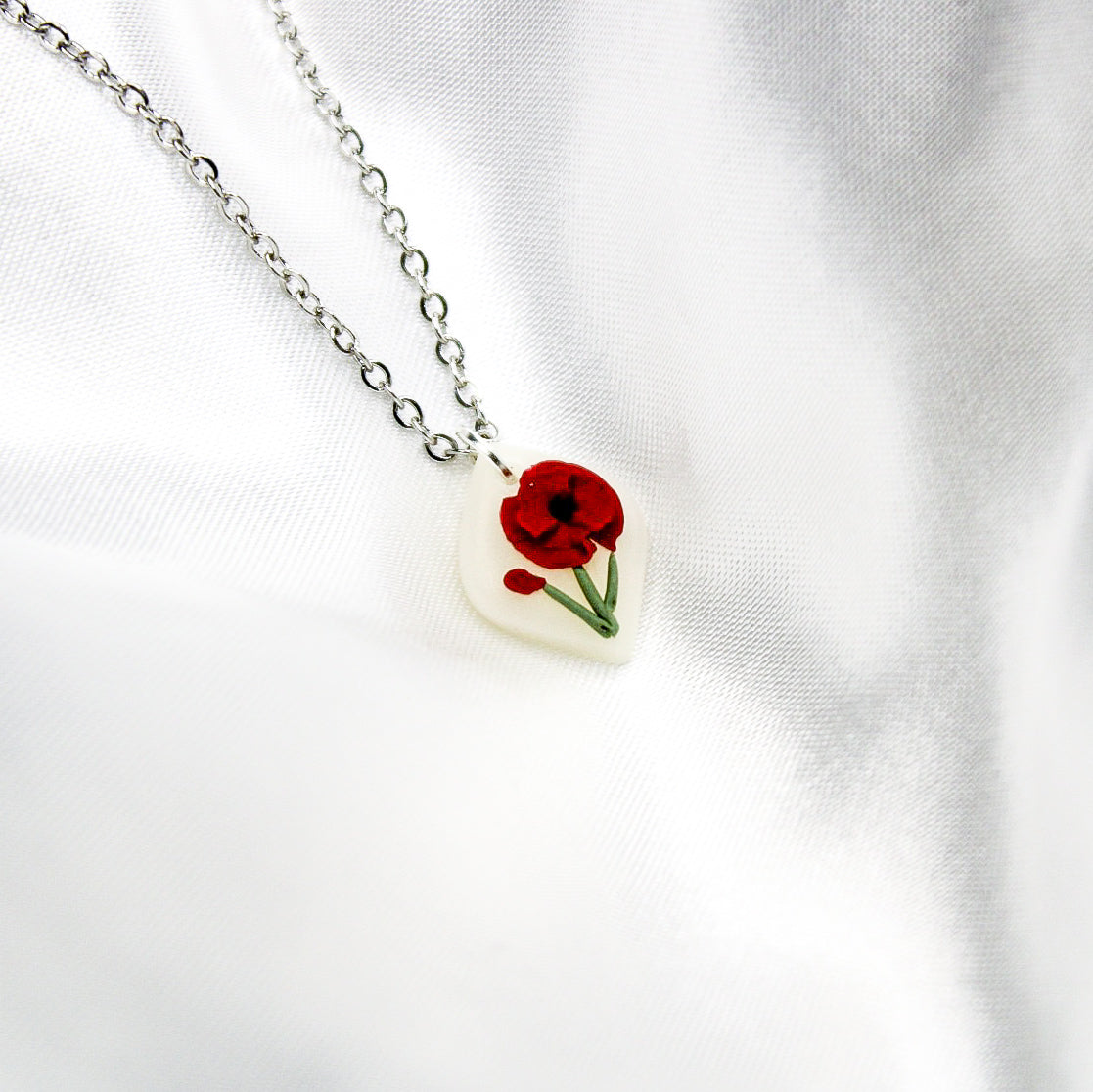 Silver raven poppy birth flower necklace — August pendant