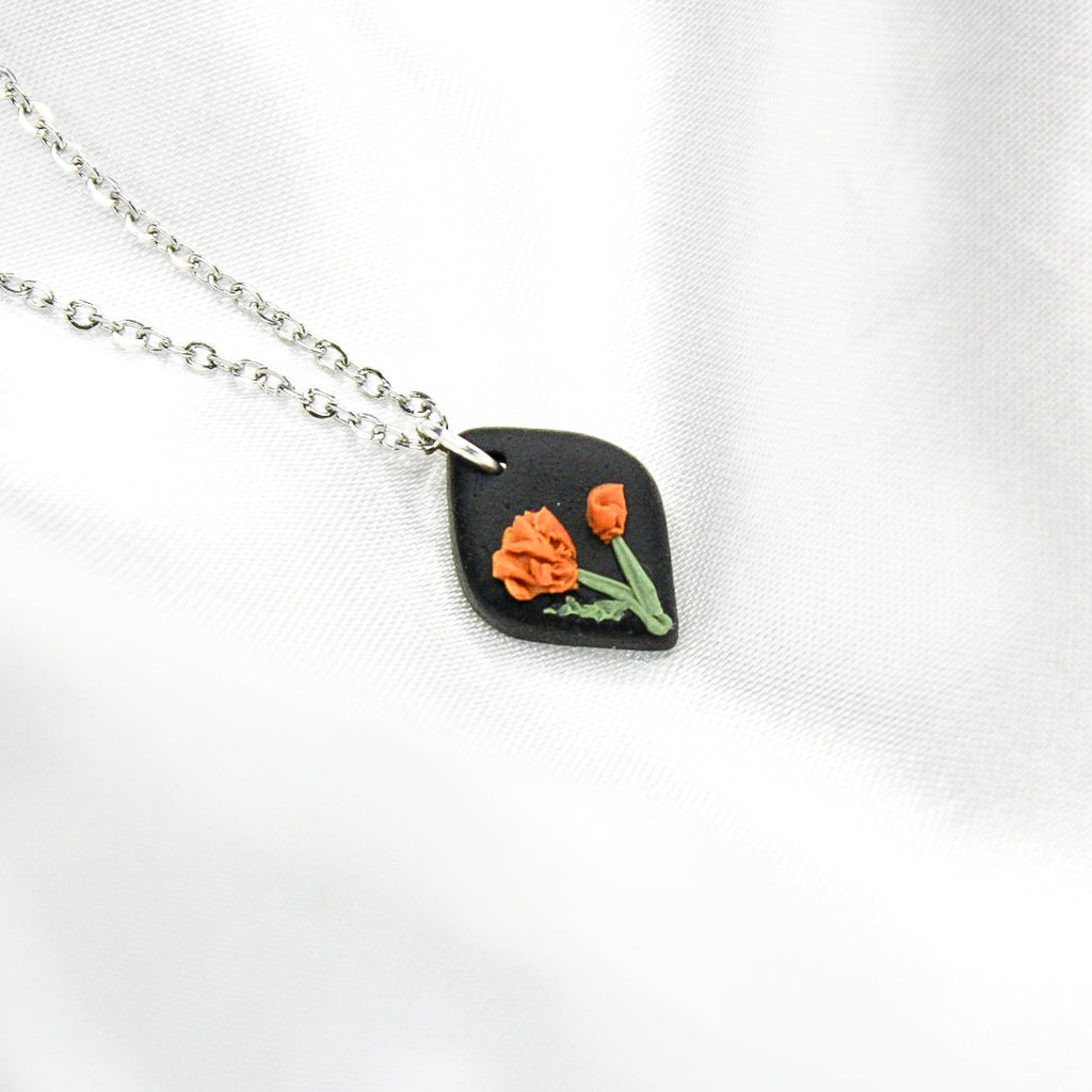 Silver raven marigold birth flower necklace — October pendant