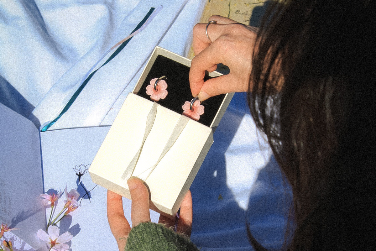cherry blossom earrings being unpacked