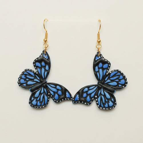 Handpainted blue butterfly polymer clay statement earrings | Shop NZ Jewellery