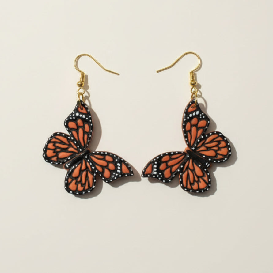 Handpainted monarch butterfly polymer clay earrings in gold | handpainted earrings NZ