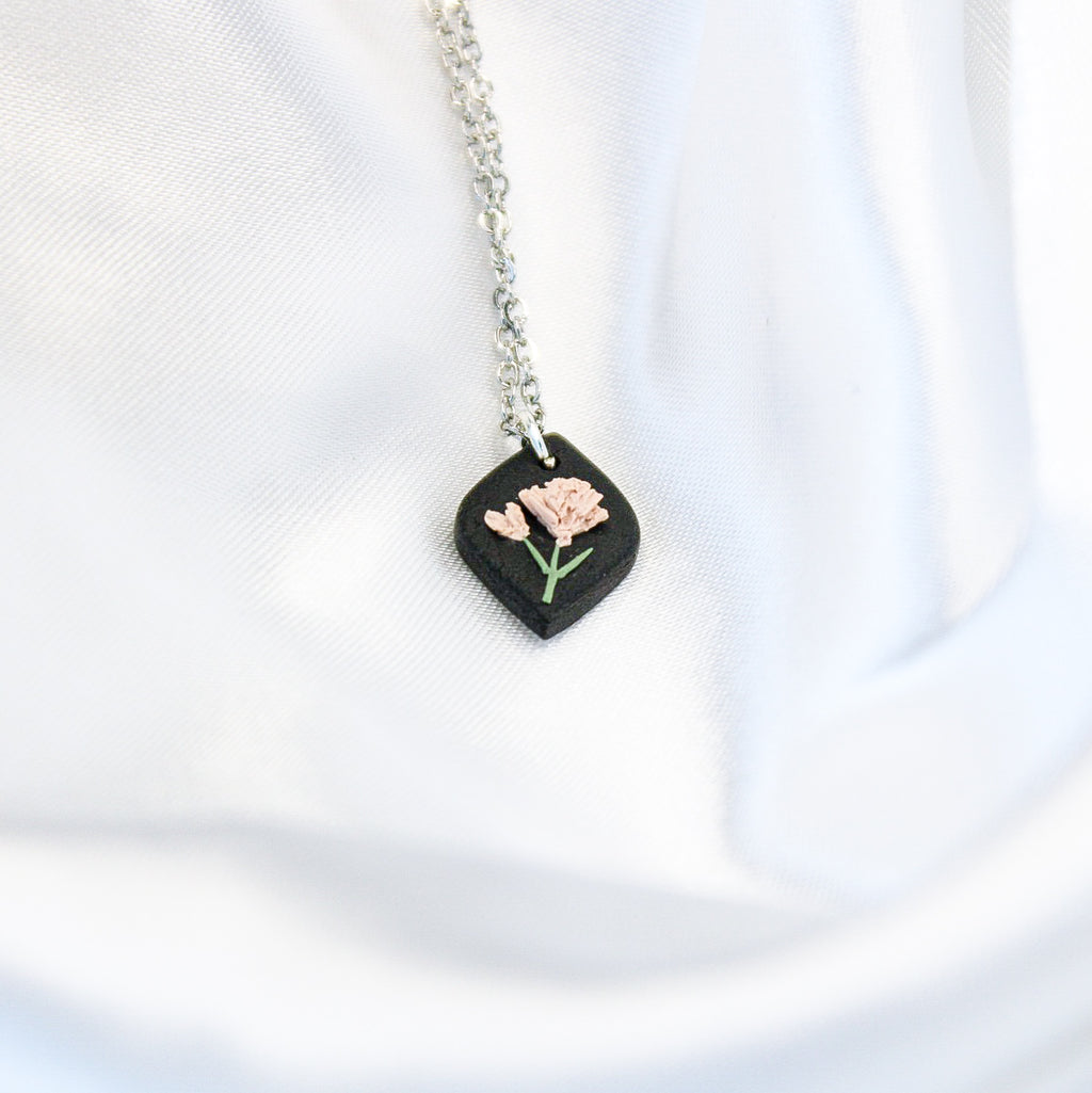 Silver raven carnation birth flower necklace — January pendant